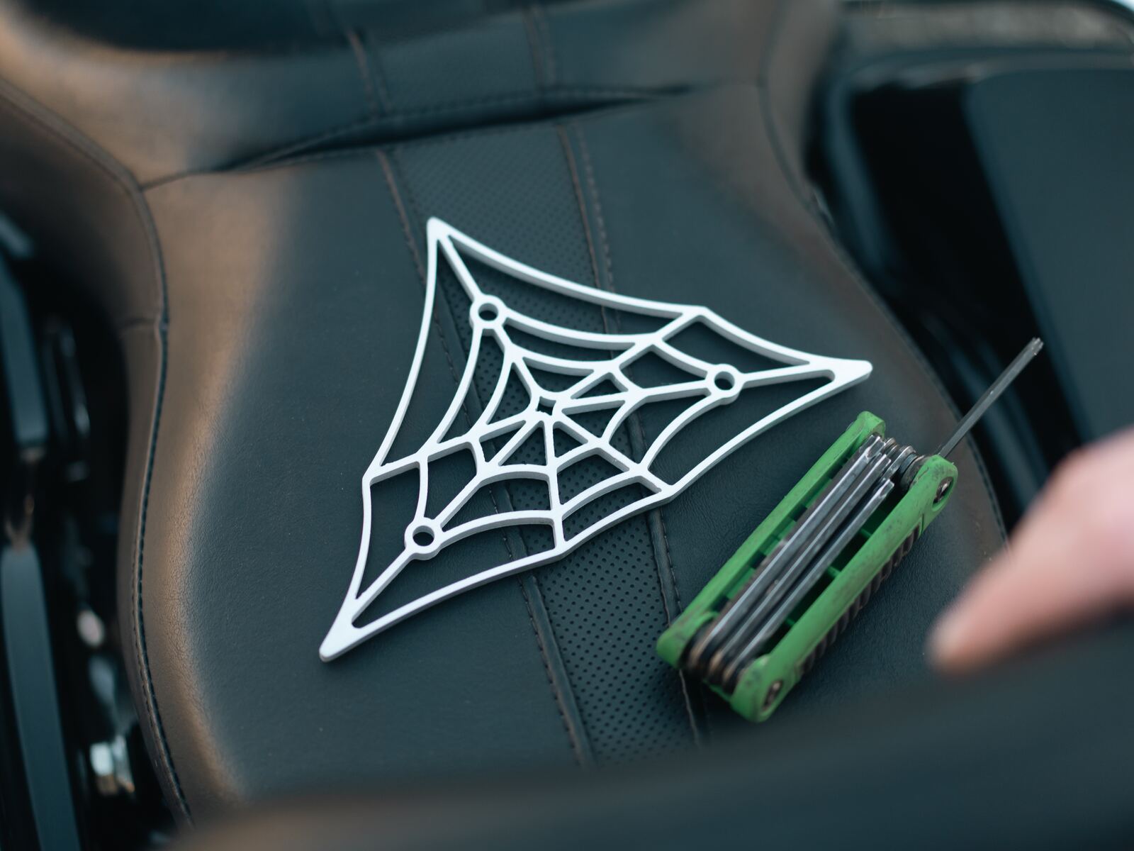 Brushed aluminum web with hand tools