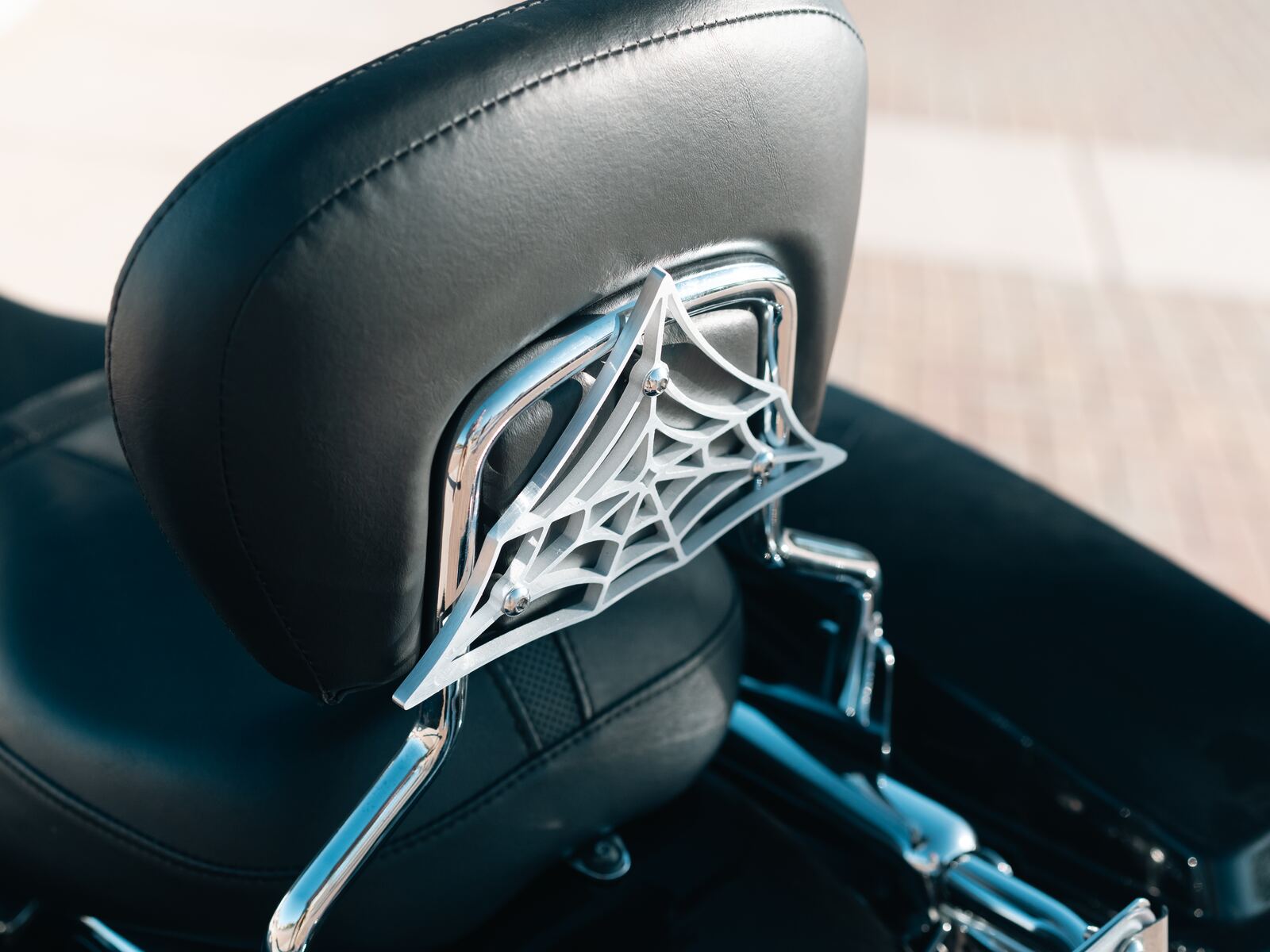 Brushed aluminum Black Widow on the backrest