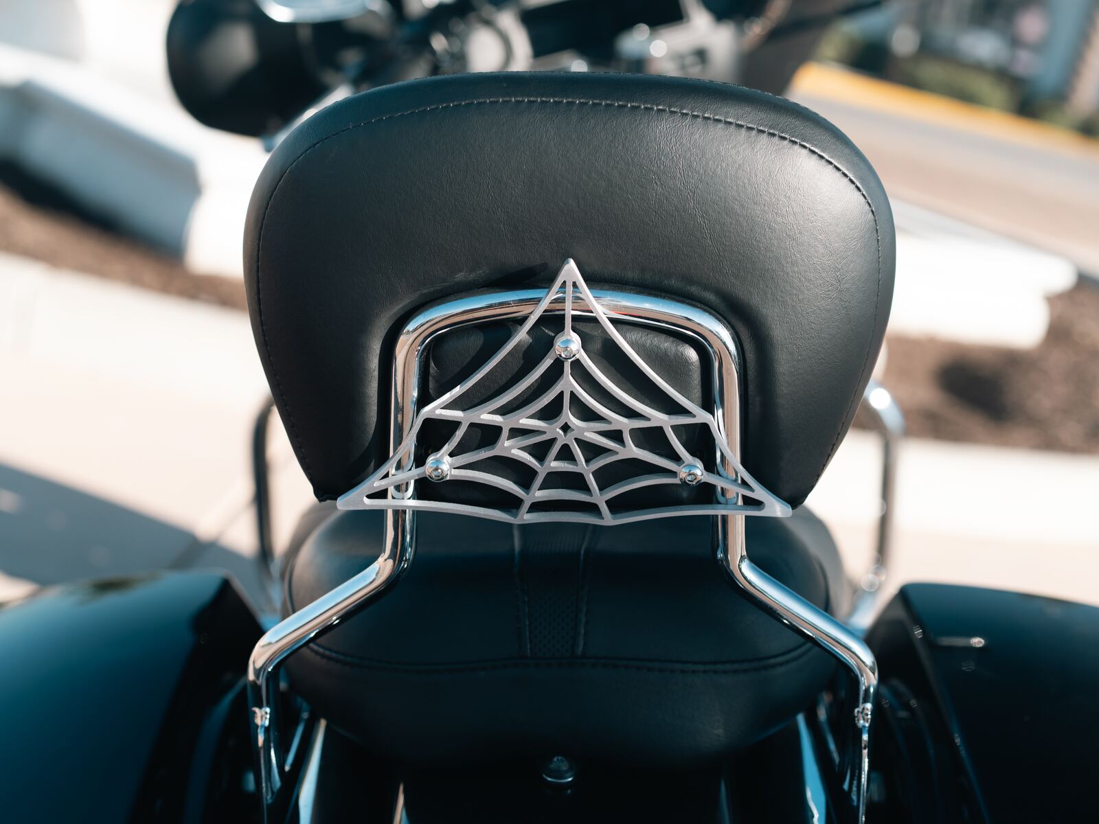 Chrome Black Widow on the backrest, straight on